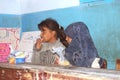 Girls having their meal at school in a camping trip in Egypt