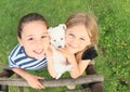 Girls holding a puppy