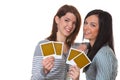 Girls with instant photos Royalty Free Stock Photo