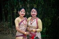 Girls isolated dressed in traditional wearing on festival with blurred background