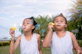 Girls kid happiness funny soap bubble in the park ,Laughing happy wi