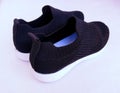 Girls knit slip on sneakers women pair of knitted shoes footwear closeup view image picture stock photo