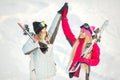 Girls posing against backdrop of mountains in ski gear. Royalty Free Stock Photo