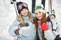Girls posing against backdrop of mountains in ski gear. Royalty Free Stock Photo