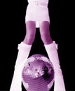 Girls legs and glitterball Royalty Free Stock Photo