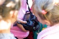 Girls are looking at photos captured on the camera_ Royalty Free Stock Photo