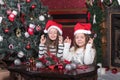 Girls makes a wish at Christmas Royalty Free Stock Photo