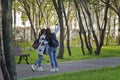 Girls making selfie in the Warriors-Winners Park in Lefortovo neighborhood of Moscow city.