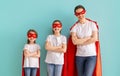 Girls and mom in Superhero costumes Royalty Free Stock Photo