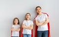 Girls and mom in Superhero costumes Royalty Free Stock Photo