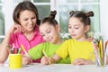 Girls with mother on lesson of art Royalty Free Stock Photo