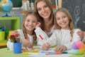 Girls with mother on lesson of art Royalty Free Stock Photo