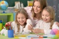 Girls with mother on lesson of art Royalty Free Stock Photo