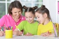 Girls with mother on lesson of art Royalty Free Stock Photo