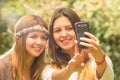 Girls outdoors posing for selfie Royalty Free Stock Photo