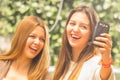 Girls outdoors posing for selfie Royalty Free Stock Photo