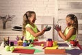 Girls painters painting with gouache paints on table Royalty Free Stock Photo