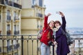 Girls in Paris taking selfie Royalty Free Stock Photo