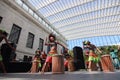 Girls play drums in the Atrium of the Cleveland Museum of Art