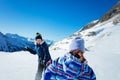 Girls play snowball fight together in the mountain Royalty Free Stock Photo