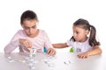 Young Girls Playing with Dominoes