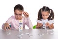 Young Girls Playing with Dominoes