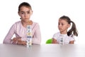 Young Girls Playing with Dominoes