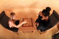 Girls playing draughts Royalty Free Stock Photo