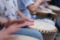Girls playing ethnic drums Royalty Free Stock Photo