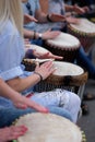 Girls playing on ethnic drums Royalty Free Stock Photo