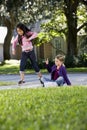 Girls playing hopscotch Royalty Free Stock Photo
