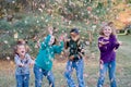 Girls Playing in Leaves