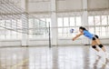 Girls playing volleyball indoor game Royalty Free Stock Photo