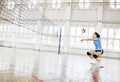 Girls playing volleyball indoor game Royalty Free Stock Photo