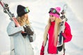 Girls posing against backdrop of mountains in ski gear. Royalty Free Stock Photo