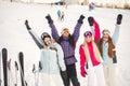 Girls posing against backdrop of mountains in ski gear. Royalty Free Stock Photo