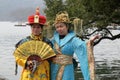 Girls posing in traditional Chinese costumes on the shores of West Lake in Hangzhou, China