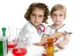 Girls pretending to be doctor in laboratory Royalty Free Stock Photo