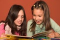 Girls reading book