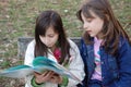 Girls reading book