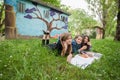 Girls reading a book in the park