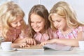 Girls reading magazine Royalty Free Stock Photo