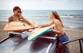 Girls ready to surf at the beach