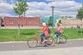 Girls ride bikes. Crimean embankment. Moscow