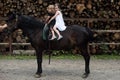 Girls ride on horse on summer day Royalty Free Stock Photo