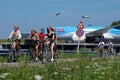 Girls riding their bikes near AMS Airport