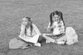 Girls school pupils doing homework together on fresh air, dreams about future concept