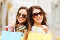 Girls with shopping bags in ctiy Royalty Free Stock Photo