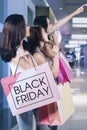 Girls with shopping bags at mall Royalty Free Stock Photo