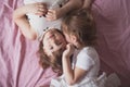Girls siblings sisters talk, children's secrets, hug, relationsh